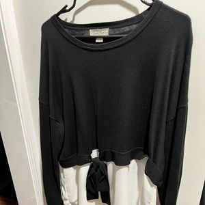 Beautiful navy blue sweater with blouse like bottom.